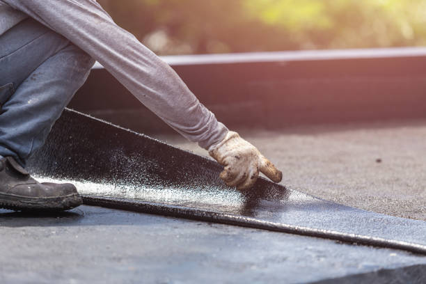 Professional Waterproofing technician working in Alexander City, AL